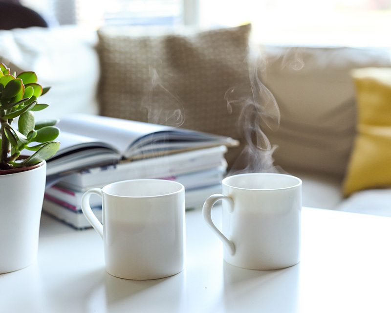 relationship_therapist Two mugs of coffee on a table for relationship therapy