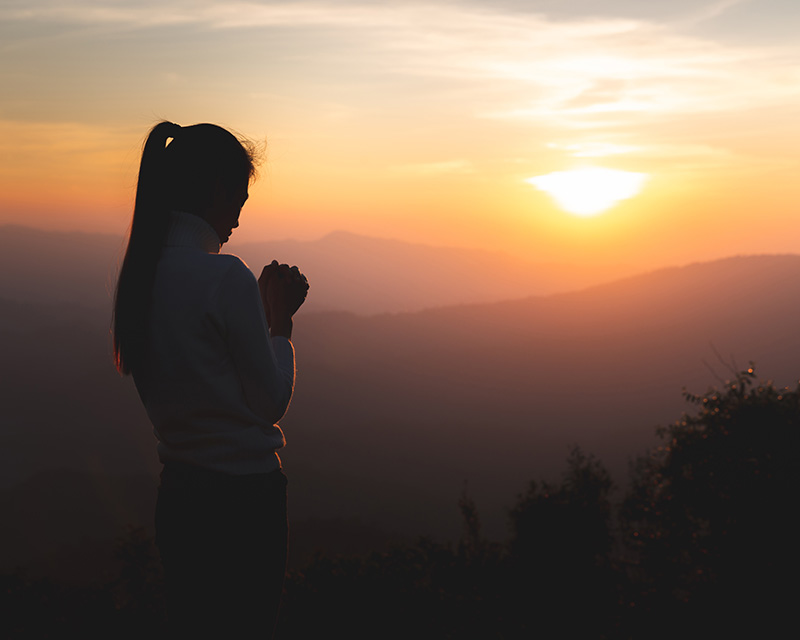 counseling_christians_pa Woman praying in the sunset after Christian Counseling in PA